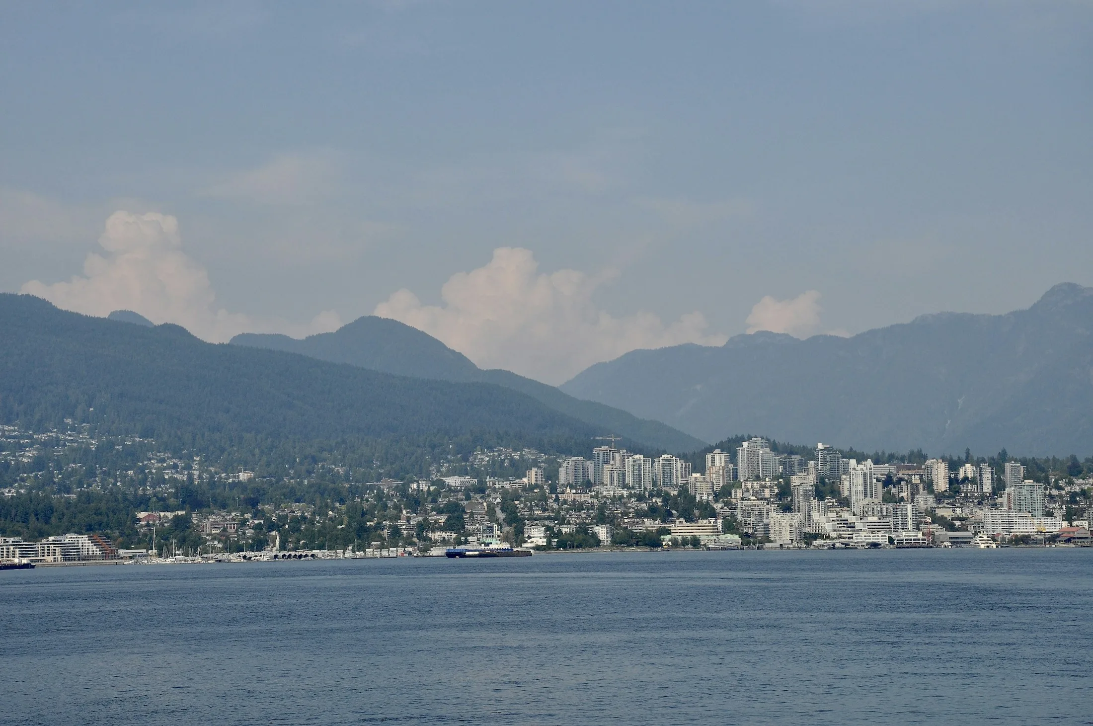Vancouver waterfront and mountain skyline, photographed by Dan Dennis